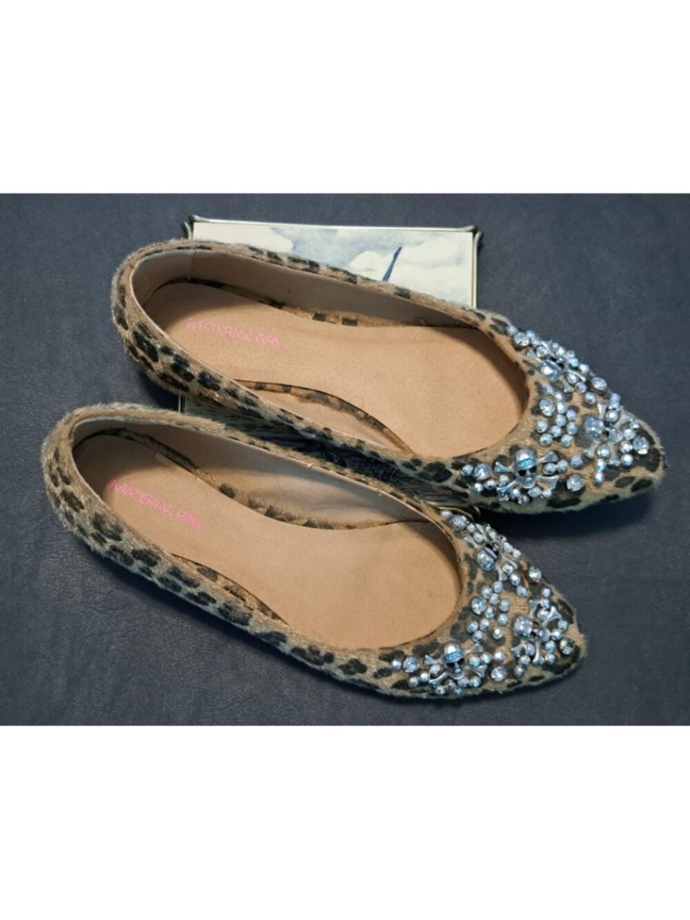 Material Girl Faux Cheetah Fur Flats with Skull Beads Embellishments.
